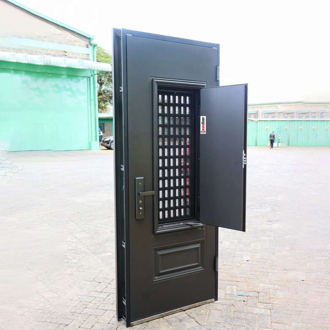 backside of gray steel security door showing the vented hatch